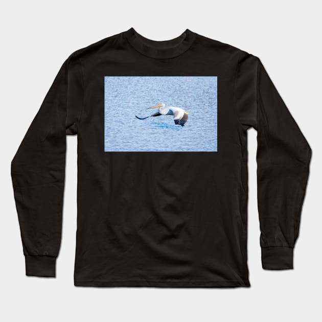 American White Pelican Gliding Along Long Sleeve T-Shirt by Debra Martz